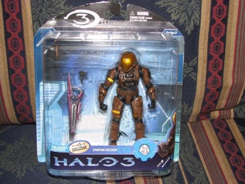 1991 Ford Bronco - Halo 3 Spartan Soldier EVA action figure, Series 2, with weapon accessory, in plastic packaging.