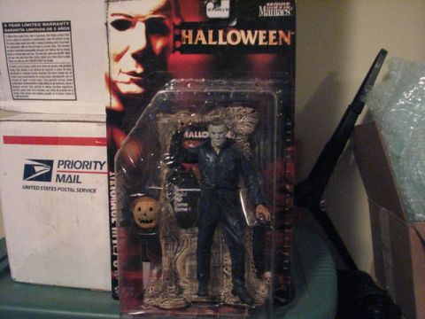 1991 Ford Bronco - Michael Myers action figure from Movie Maniacs Halloween line, packaged for sale.