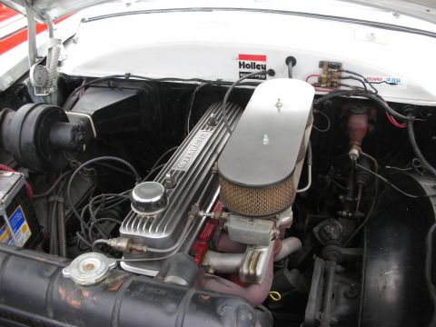 1998 Ford Crown Victoria - Engine bay view of a V8 engine, a Holley carburetor and air cleaner assembly.