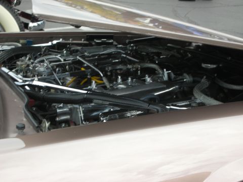 1998 Ford Crown Victoria - Close-up view of a car's engine bay, showing intricate mechanical components.