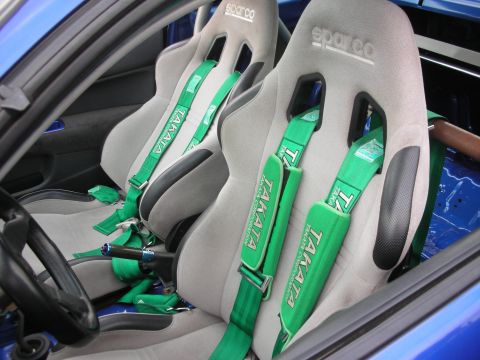 1998 Ford Crown Victoria - The interior features racing seats and harnesses, not a 1998 Ford Crown Victoria.