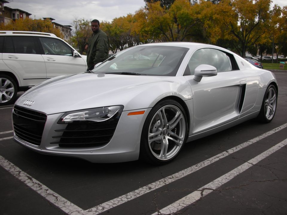 Silver first-generation Audi R8 coupe parked at an outdoor meet