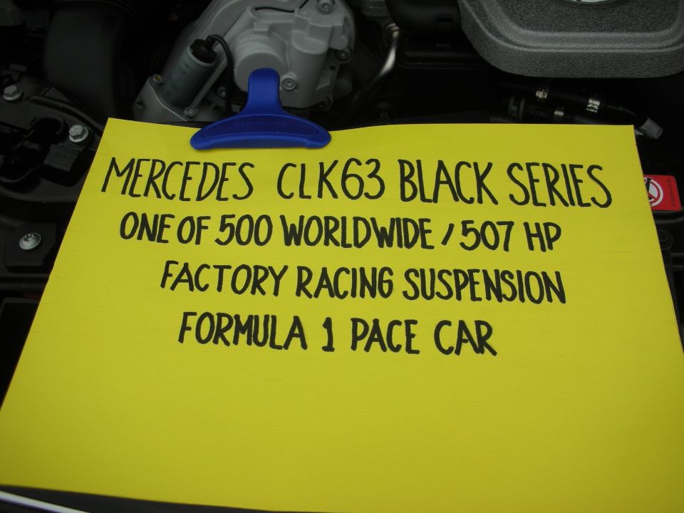 Handwritten car-show sign listing Mercedes CLK63 Black Series specs