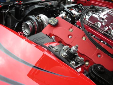 1998 Ford Crown Victoria - Engine bay detail a turbocharger and custom red components.