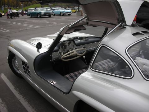1998 Ford Crown Victoria - Photograph of a Mercedes-Benz 300SL Gullwing showing the open door, dashboard, and steering wheel.