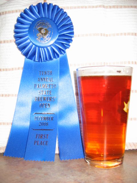 1985 Ford LTD Crown Victoria - A blue ribbon and a glass of beer, likely a prize from a brewing competition.