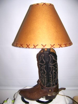 1991 Ford Bronco - A novelty lamp is made from a cowboy boot and has a conical lampshade with stitched edges.