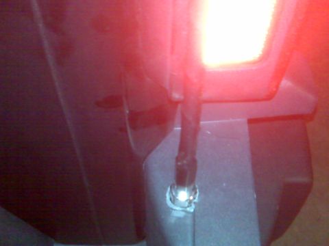 2008 Jeep Wrangler - A close-up shot shows a small, illuminated LED light protruding from a dark gray panel. The panel appears to be part of a vehicle's interio…