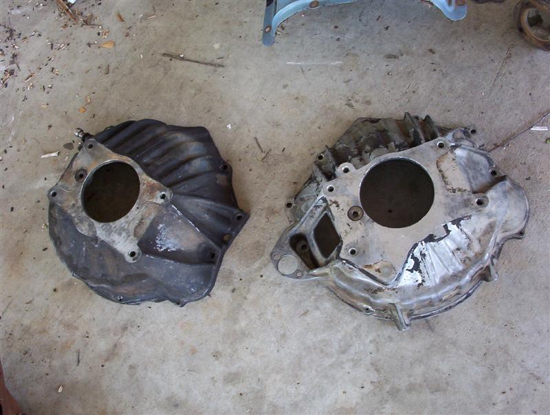 two transmission bell housings on concrete floor