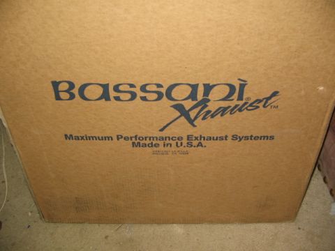 1991 Ford Bronco - A cardboard box with text and a logo is shown.