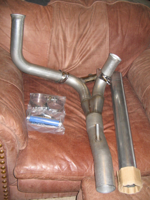 1991 Ford Bronco - Close-up view of an exhaust pipe system.