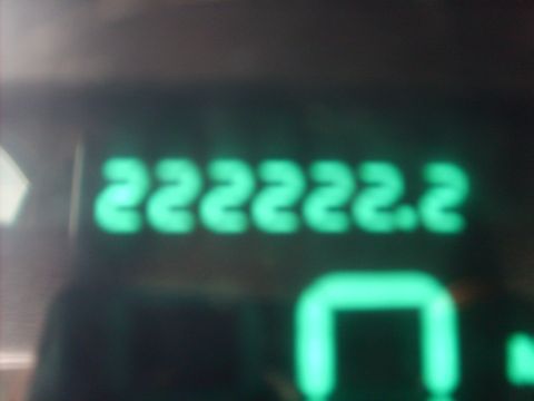 1993 Ford Crown Victoria - A digital odometer displays 222222.2 miles. Below it, a green U-shaped indicator light is illuminated.