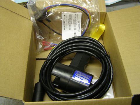 1993 Ford Bronco - A Superwinch wired remote control and wiring harness are shown inside an open cardboard box.