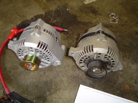 1989 Ford Bronco - Comparison of a new and used alternator, likely for a 3G alternator swap.