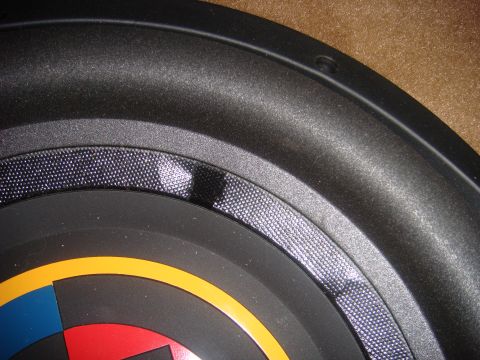 1996 Ford Bronco - A car speaker is shown in a close-up view with colorful accents.