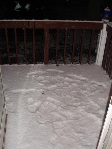 1996 Ford F-150 - Snow covers a wooden deck and railing. The Supermotors.net logo is visible in the lower right corner.