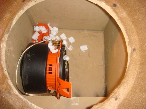 1996 Ford Bronco - A speaker is shown inside a wooden enclosure with packing material.