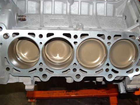2007 Ford Mustang - Photograph of an engine block showing pistons and head gasket, not a technical document.