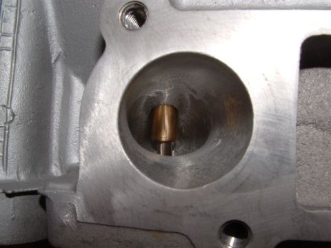 2007 Ford Mustang - Photograph of a cylinder head port, not a technical document.