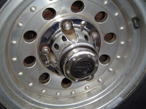 1991 Ford Bronco - Lug nut cap thingy back on