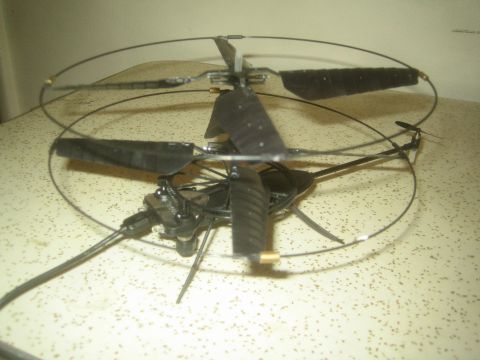 1968 Ford Mustang - photograph of an RC helicopter on a table, not a technical document.