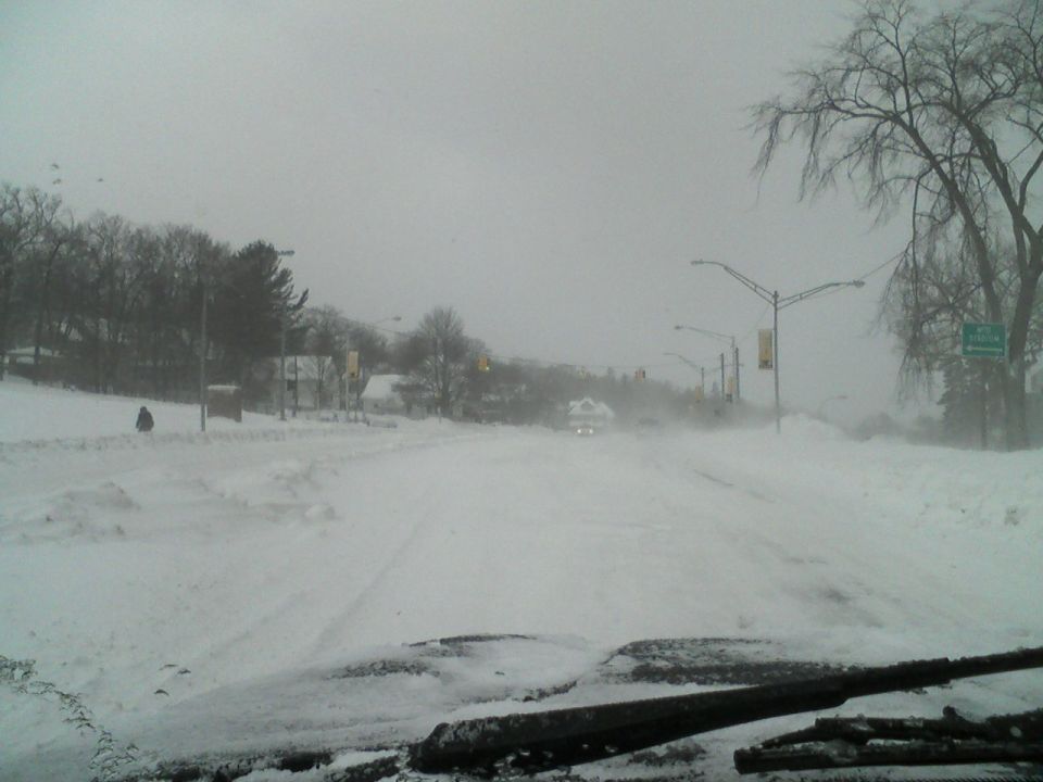 2000 Chevrolet Tahoe driving through a snowstorm.