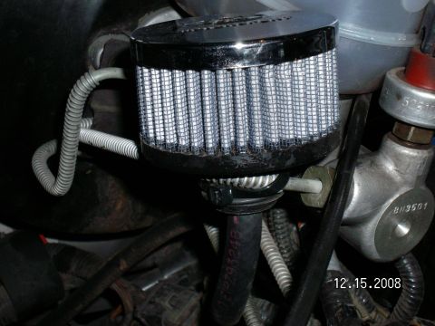 1996 Ford Bronco - Simple "push-in" filter used to vent and keep water out of the diffs. Hose slips up inside and a "Zip-tie" keeps the filter from banging ar…