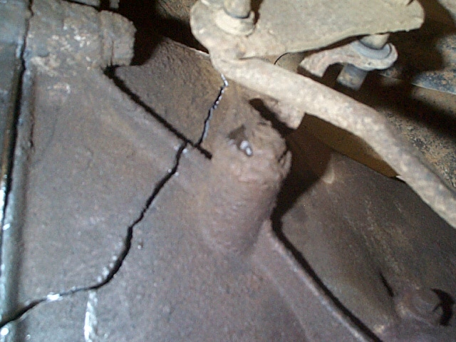 Stock Driveshafts couldn't handle the angles, and SHATTERED MY TRANNY!!