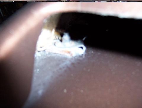 1975 Ford Granada - hood scoop mounting... small L bracket screwed fast to scoop (on side) and nut clip (bottom against hood). bolted underneath hood.