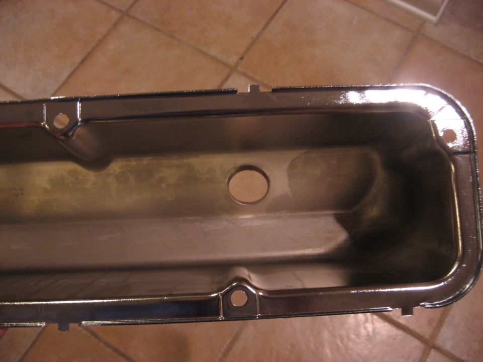 Chrome valve cover with circular opening