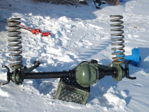 1989 Ford Bronco - alxe assembled (partially) arms spring cover and yeah I am doing this outside in the snow 6" to be exact it sucks. should be hanging by sun…