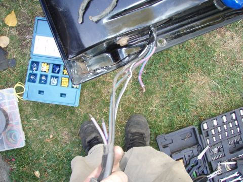 1992 Ford Bronco - i realized that the wires were chafed on the wiring harness by the tailgate closing on them. i cut back the wires and re-attached them with…