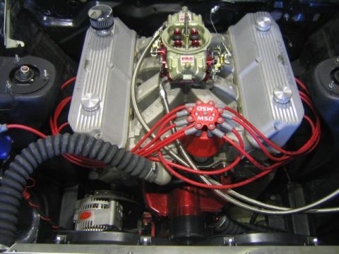 1969 Mercury Cyclone - Close-up view of a modified engine bay, showing various performance components and wiring.