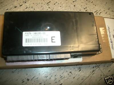 2007 Ford Mustang - This is a Ford electronic control module, likely for a vehicle part.