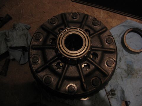 1989 Ford Bronco - A differential carrier with a bearing is shown, likely part of a vehicle's drivetrain.