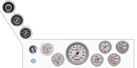 1993 Ford Taurus - A collection of automotive gauges, including a tachometer and various sensor readouts, are displayed on a white surface.