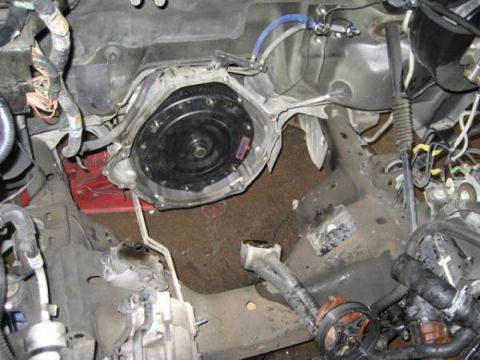 2007 Ford Mustang - Underside view of a vehicle's transmission and engine bay components, showing various parts and wiring.