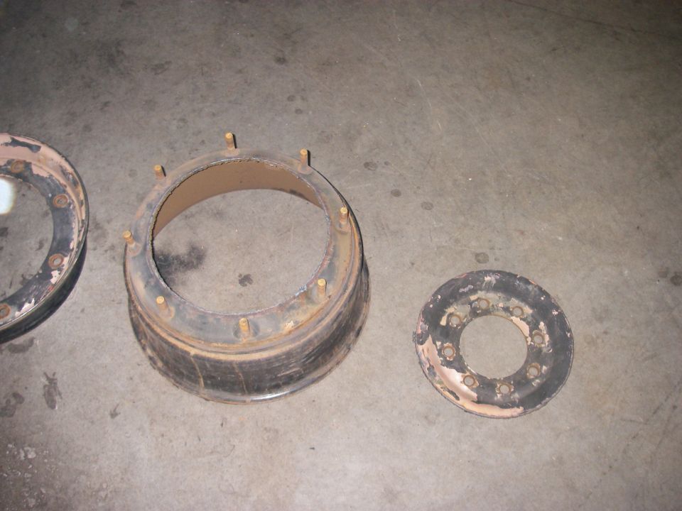 Wheel hub assembly and separate ring with studs on concrete floor