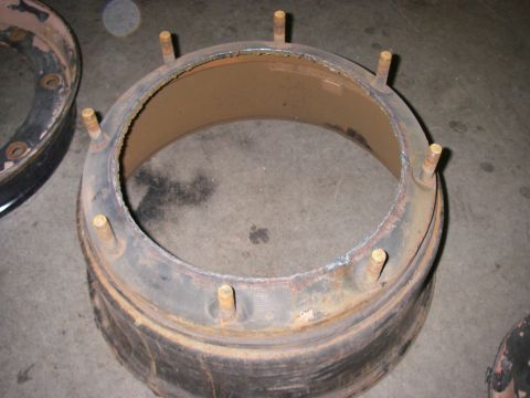 1978 Ford Bronco - A rusty wheel hub with protruding studs is shown, likely a replacement part.