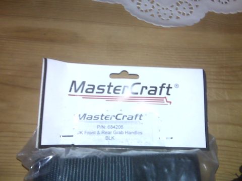 2008 Jeep Wrangler - Packaging for MasterCraft JK Front & Rear Grab Handles is shown, with a part number visible.