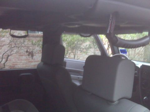 2008 Jeep Wrangler - Interior grab handles are visible in this Jeep Wrangler, likely for off-road use.