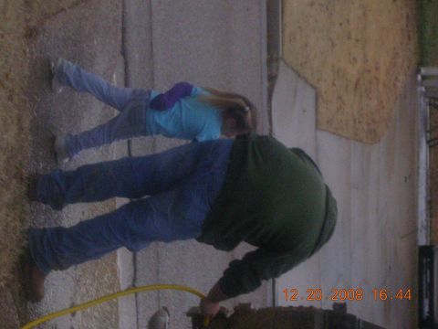 1994 Ford Bronco - Two people are seen working on a vehicle, with a timestamp indicating the date and time as December 20, 2008, at 4:44 PM.