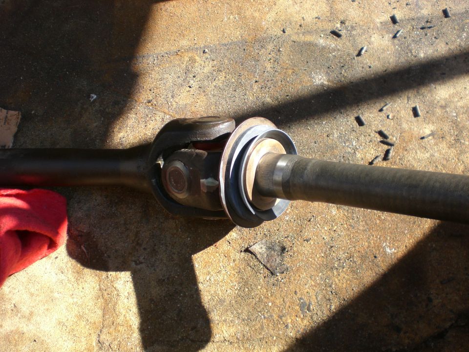 Inner FORD axle, outer CHEVY stub. New u-joint part number 297X same ford or chevy and new inner spindle seal part number 22311 same ford or chevy