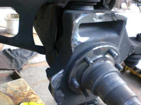 1990 Ford Bronco - This is about how much grinding I had to do on the knuckles. Used the longer chevy spindle studs. You can only remove 5 from the chevy axle…