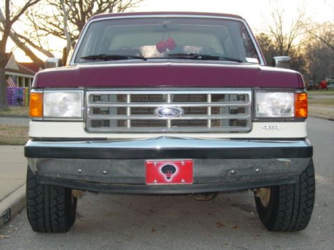 1988 Ford Bronco - Front view of a 1987 Ford Bronco, a custom skull license plate.