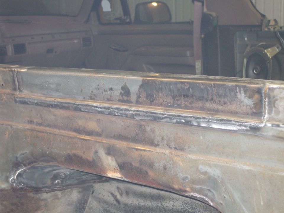 drivers side rail cut out and repaired, this side had holes in it on the top