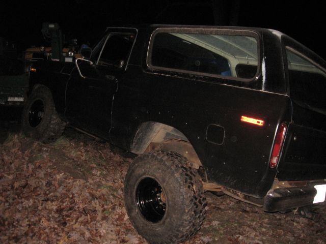 1978 Ford Bronco rear quarter view, black with large tires
