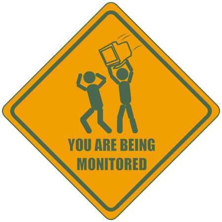 2000 Mercury Grand Marquis - This sign warns that surveillance is in progress, a humorous depiction of monitoring.