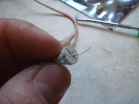 1998 Volvo V70 - Unwind the wires and pull the bulb straight out of the holder