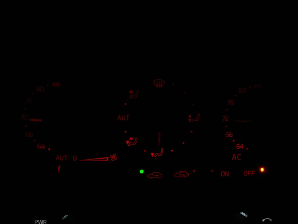 The climate control turned out a lot better than it looks in this picture; there are no hot spots and the light distribution is even.  The whole unit is readable while driving, but I think I'm going to move to some bigger bulbs.  These are 3 mm and I think I'm going to try 5 mm or T5s.